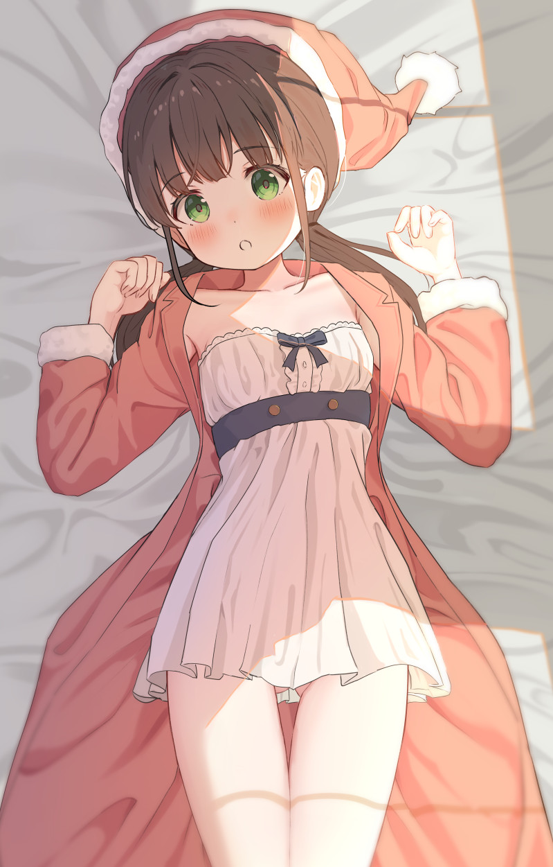 1girl :o bed_sheet blush breasts brown_hair coat collarbone commentary_request dress fur-trimmed_sleeves fur_trim gluteal_fold green_eyes hands_up hat highres long_hair long_sleeves looking_at_viewer low_twintails lying mimikaki_(men_bow) on_back open_clothes open_coat original parted_lips red_coat red_hat santa_costume santa_hat small_breasts solo strapless strapless_dress twintails white_dress