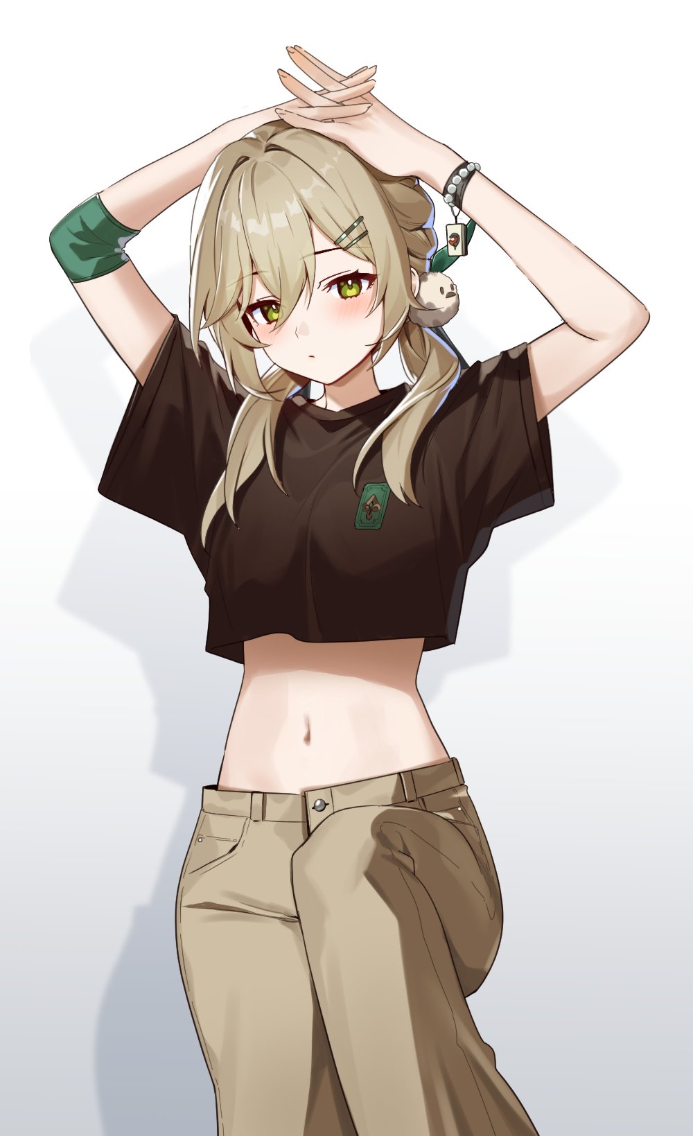 1girl alternate_costume arms_on_head arms_up black_shirt bracelet breasts brown_hair brown_pants commentary cropped_shirt elbow_pads green_eyes hair_between_eyes hair_ornament hievasp highres honkai:_star_rail honkai_(series) jewelry low_twintails medium_breasts midriff navel pants pearl_bracelet pom_pom_(clothes) pom_pom_hair_ornament qingque_(honkai:_star_rail) shadow shirt short_sleeves simple_background single_elbow_pad stomach twintails white_background