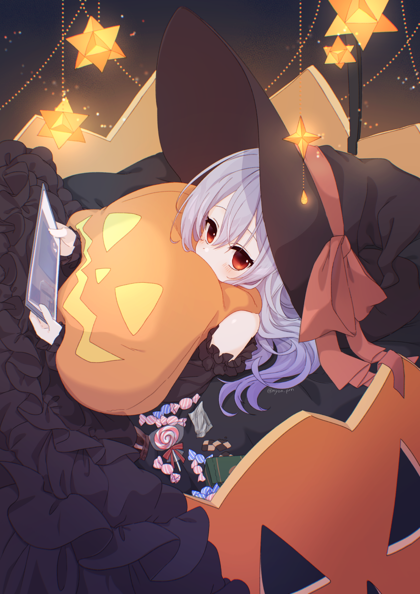 1girl bare_shoulders black_dress black_hat blush candy candy_wrapper commentary_request covered_mouth dress food frilled_dress frills grey_hair hair_between_eyes halloween hat highres holding jack-o&#039;-lantern lollipop long_sleeves nishi_(nyon_prn) original puffy_long_sleeves puffy_sleeves red_eyes solo swirl_lollipop witch_hat