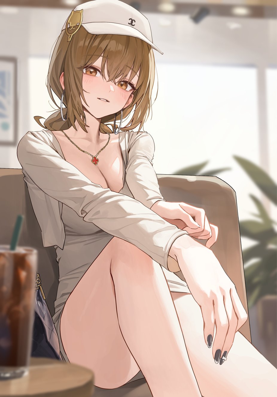 1girl alternate_costume anis_(nikke) bare_legs baseball_cap blush breasts brown_hair cleavage collarbone commentary cropped_jacket dress feet_out_of_frame fingernails goddess_of_victory:_nikke grey_dress hat highres indoors jacket jewelry knee_up large_breasts looking_at_viewer nail_polish necklace sitting solo white_hat white_jacket xi_xeong