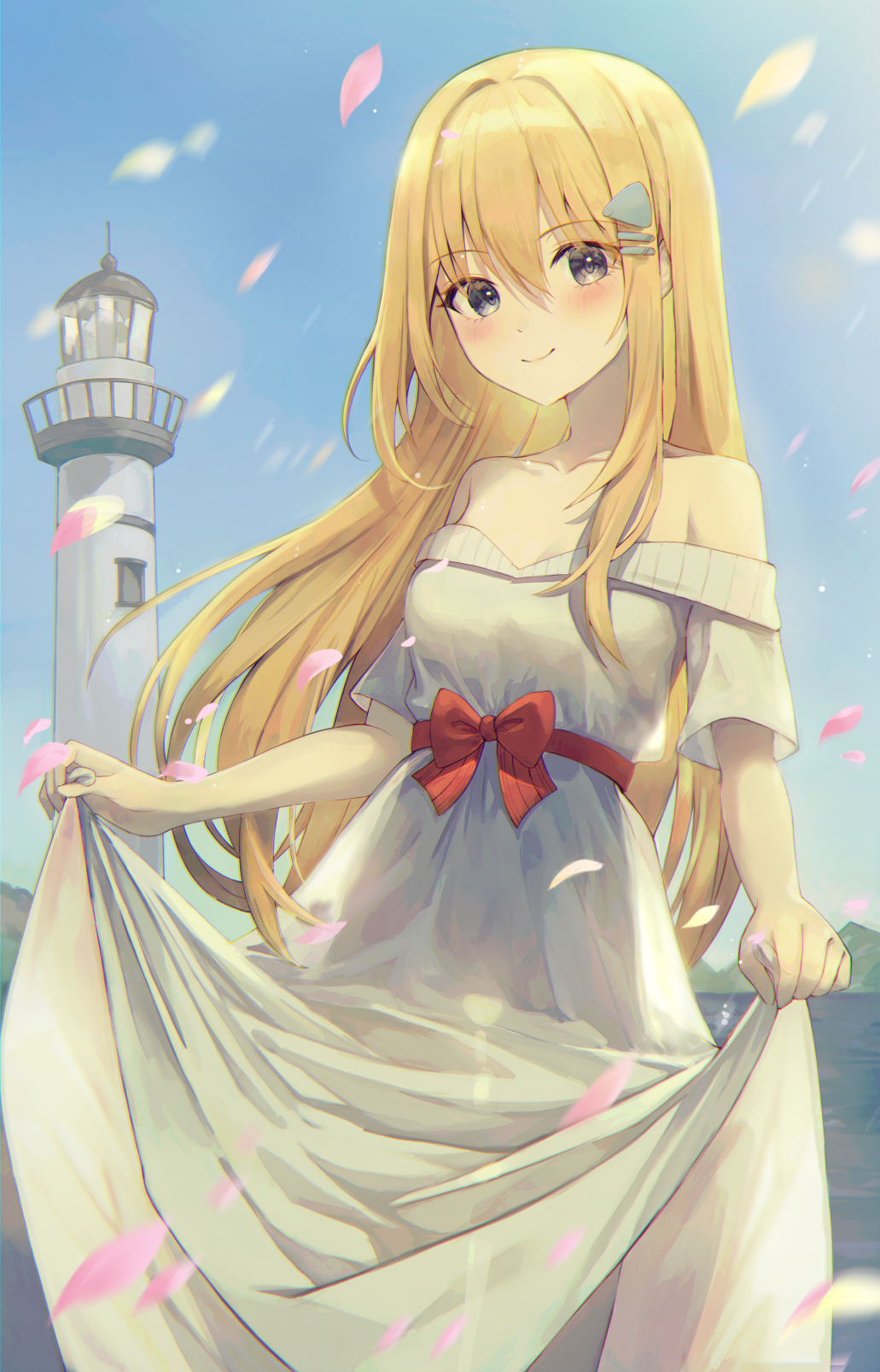 1girl bare_shoulders blonde_hair blue_sky blush bow breasts closed_mouth collarbone commentary_request day dress grey_eyes hair_between_eyes hair_ornament hairclip highres lighthouse long_hair looking_at_viewer off-shoulder_dress off_shoulder original outdoors petals red_bow short_sleeves skirt_hold sky small_breasts smile solo very_long_hair wakum water white_dress