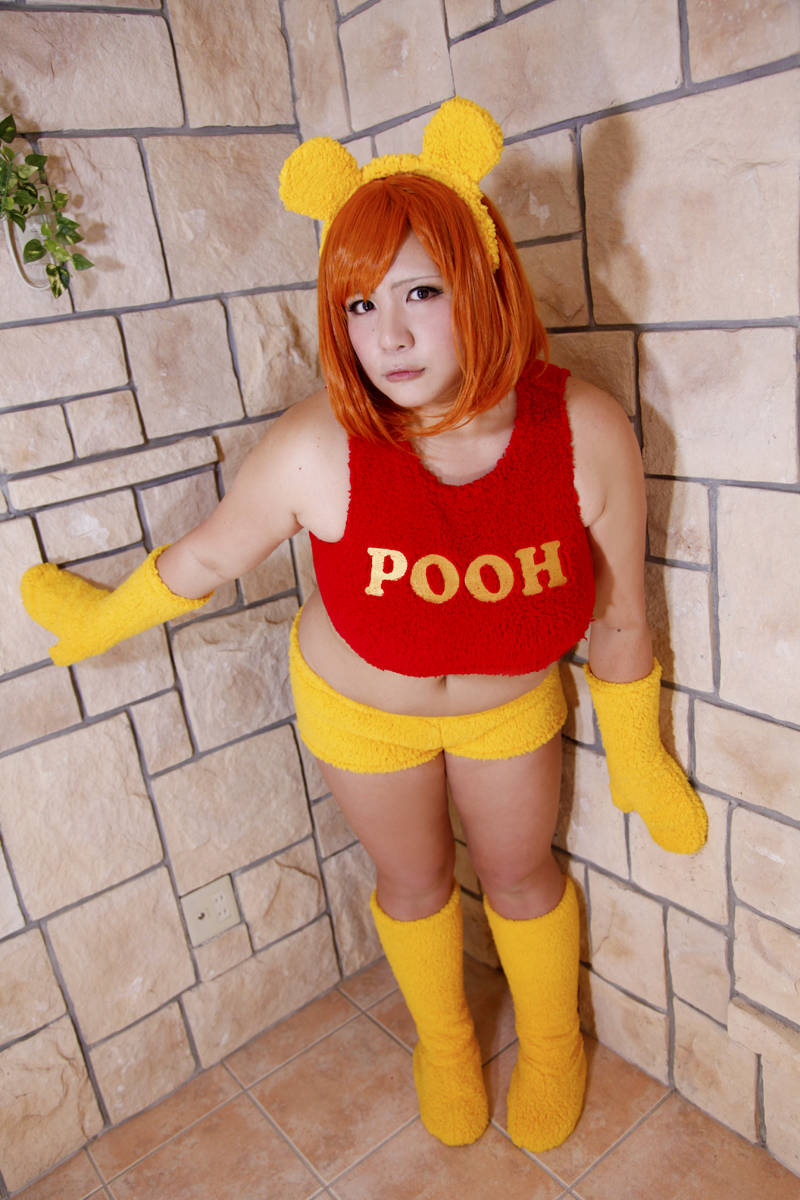 1girl animal_ears asian bear_ears chouzuki_maryou cosplay gloves highres orange_hair photo_(medium) plump pooh pooh_(cosplay) shirt solo t-shirt winnie_the_pooh