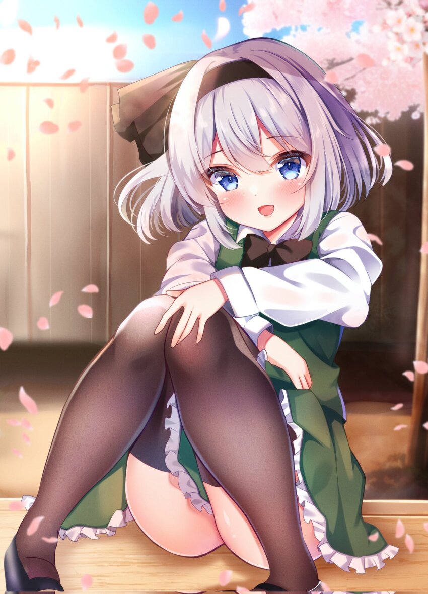 1girl :d ass black_bow black_bowtie black_forest_cake black_hairband black_thighhighs blue_eyes blush bow bowtie cake cherry_blossoms commentary food full_body green_skirt green_vest grey_hair hairband highres knees_up konpaku_youmu long_sleeves looking_at_viewer open_mouth outdoors shirotsuki_shirone shirt short_hair sitting skirt smile solo thighhighs touhou vest white_shirt