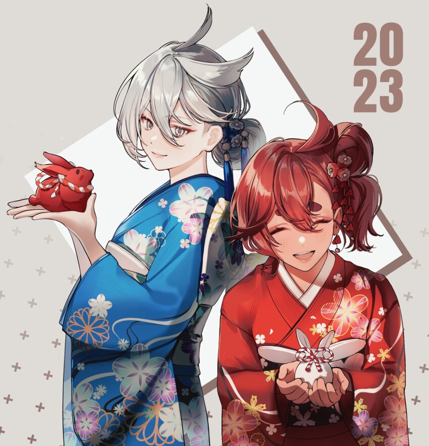 2023 2girls ahoge alternate_hairstyle animal blue_kimono chinese_zodiac closed_eyes closed_mouth dark-skinned_female dark_skin floral_print folded_ponytail from_side furisode grey_eyes grey_hair gundam gundam_suisei_no_majo hair_between_eyes hair_ornament hair_up highres holding holding_animal japanese_clothes kimono laun_000 long_sleeves looking_at_viewer miorine_rembran multiple_girls new_year obi open_mouth print_kimono rabbit red_kimono sash short_hair smile standing suletta_mercury tassel tassel_hair_ornament wide_sleeves year_of_the_rabbit