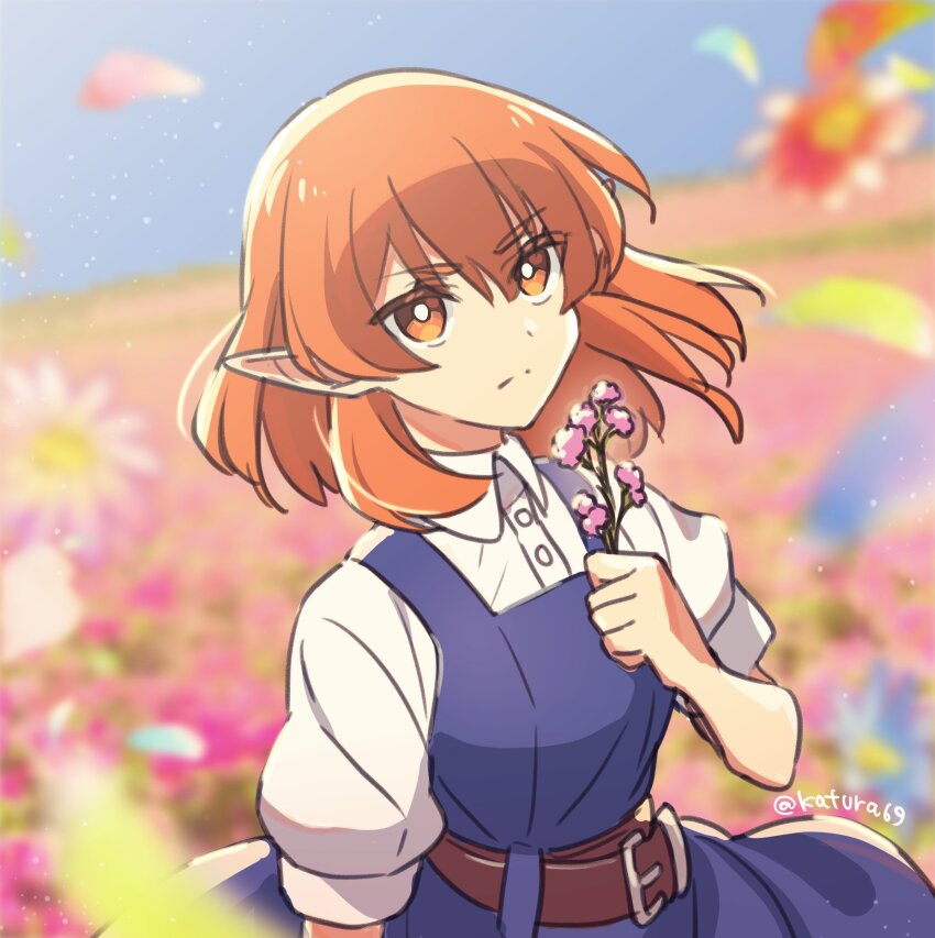 1girl belt belt_buckle blue_dress blue_sky breasts buckle collared_shirt dress falling_petals field flower flower_field hair_between_eyes helck highres holding holding_flower katsura_ichiho looking_at_viewer medium_hair orange_eyes orange_hair outdoors petals pointy_ears puffy_sleeves shirt sky small_breasts solo twitter_username vermilio_(helck) white_shirt