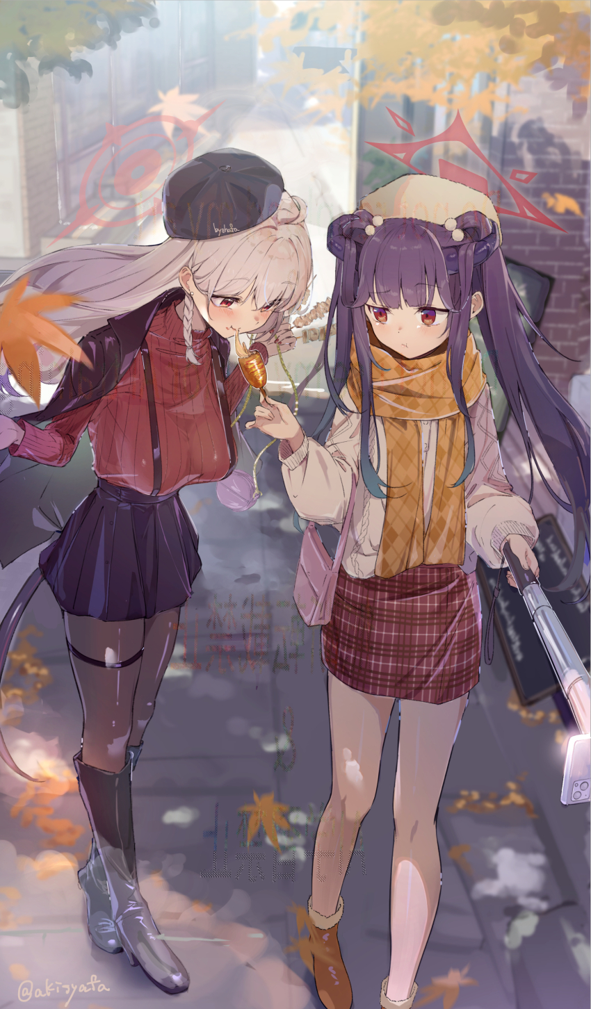 2girls absurdres autumn_leaves bag black_skirt blue_archive blush boots braid breasts brick_wall brown_eyes building cellphone character_request closed_mouth coat coat_on_shoulders commentary_request corn_dog day food hair_ornament halo handbag hat high_heel_boots high_heels highres holding holding_skewer holding_stick kebab large_breasts leaf leaning_forward long_hair miniskirt multiple_girls outdoors pantyhose phone plaid_clothes plaid_skirt pleated_skirt pom_pom_(clothes) pom_pom_hair_ornament purple_hair red_eyes red_halo ribbed_sweater scarf selfie_stick side_braid sidelocks sign skewer skirt smartphone stick suspender_skirt suspenders sweater syafa thigh_strap twintails twitter_username