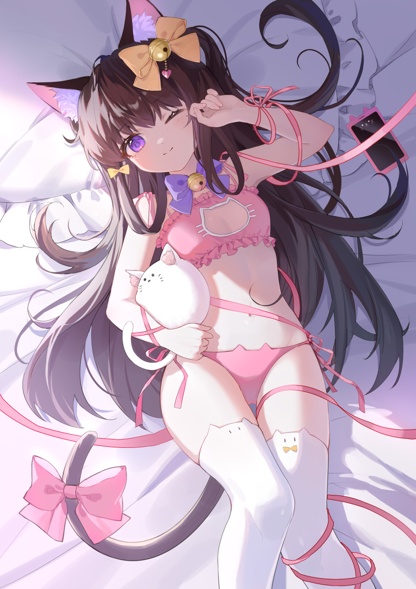 1girl absurdres animal_ear_fluff animal_ears bed_sheet bell bow bowtie bra breasts brown_hair brown_tail cat_cutout cat_ear_legwear cat_ear_panties cat_ears cat_girl cat_tail cellphone cleavage_cutout closed_mouth clothing_cutout feet_out_of_frame frilled_bra frilled_pillow frills hair_bell hair_bow hair_ornament hair_spread_out hand_to_head hand_up head_on_pillow highres holding jingle_bell knees_together_feet_apart long_hair long_ribbon looking_at_viewer lying mole mole_under_eye morimori_(14292311) navel neck_bell on_back one_eye_closed one_side_up original panties phone pillow pink_bow pink_bra pink_panties pink_ribbon purple_bow purple_bowtie purple_eyes ribbon side-tie_panties small_breasts smartphone smile solo tail tail_bow tail_ornament thigh_gap thighhighs underwear very_long_hair white_thighhighs wrist_ribbon yellow_bow