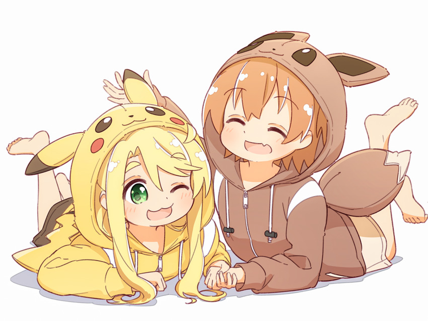 2girls :3 barefoot blonde_hair blush brown_hair commentary cosplay creatures_(company) eevee eevee_(cosplay) eevee_ears eevee_tail closed_eyes fang feet_up game_freak gen_1_pokemon green_eyes highres himesaka_noa holding_hands hood hoshino_hinata lying manse multiple_girls nintendo on_stomach one_eye_closed open_mouth pikachu pikachu_(cosplay) pikachu_costume pikachu_hood pikachu_tail pokemon animal_ears pokemon_tail simple_background skin_fang tail watashi_ni_tenshi_ga_maiorita! white_background