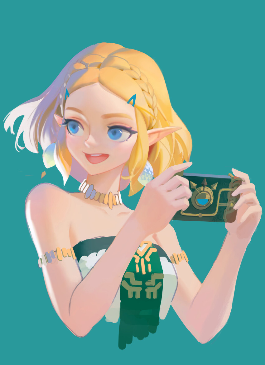 1girl absurdres aqua_background armlet blonde_hair blue_eyes braid crown_braid earrings ga_is hair_ornament hairclip handheld_game_console highres jewelry medium_hair necklace nintendo open_mouth pointy_ears princess_zelda simple_background smile solo strapless the_legend_of_zelda the_legend_of_zelda:_tears_of_the_kingdom video_game