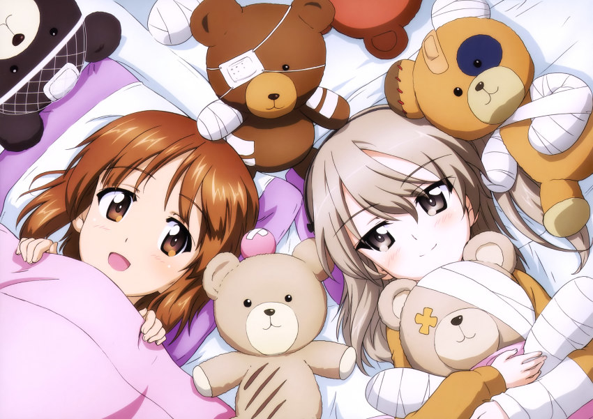 10s 2girls :d absurdres bed_sheet black_hairband blush brown_eyes brown_hair from_above girls_und_panzer hair_between_eyes hairband highres holding holding_stuffed_toy long_hair looking_at_viewer multiple_girls nishizumi_miho official_art open_mouth pillow shimada_arisu side_ponytail silver_hair smile stuffed_animal stuffed_toy upper_body yoshida_nobuyoshi