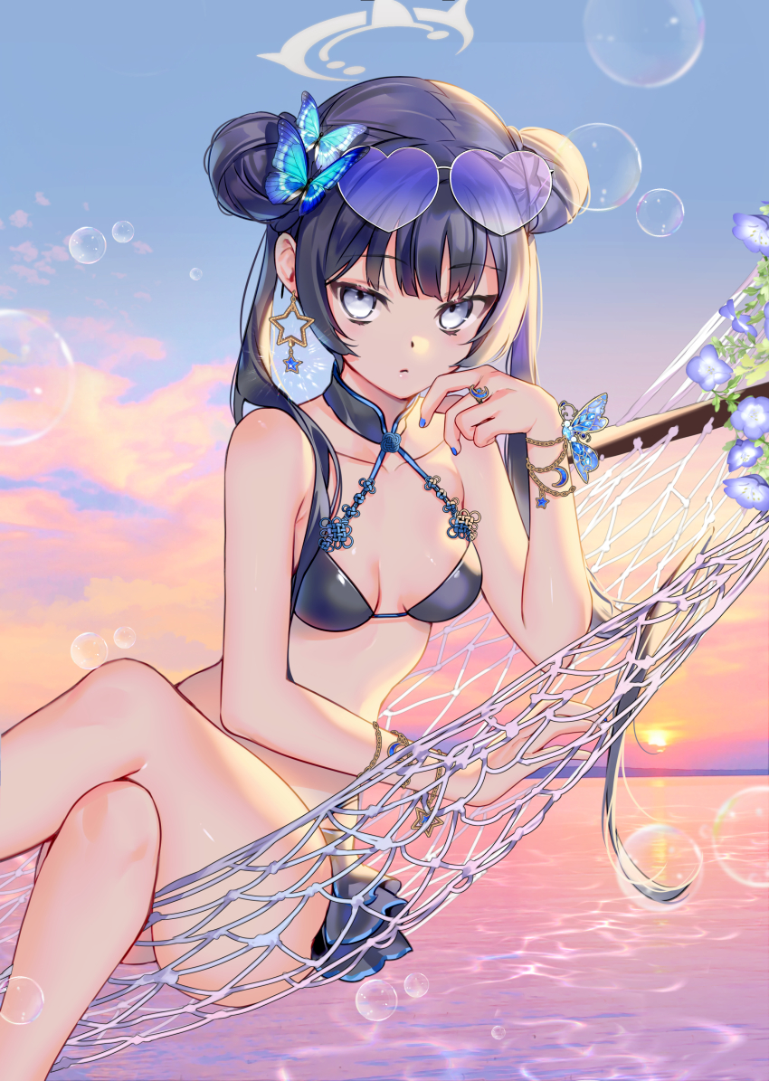 1girl absurdres bare_shoulders bikini black_bikini black_hair black_joa blue_archive blue_sky blush bracelet braid braided_bun breasts butterfly_hair_ornament crossed_legs double_bun earrings eyewear_on_head gradient_sky grey_eyes hair_bun hair_ornament halo hammock heart heart-shaped_eyewear highres jewelry kisaki_(blue_archive) long_hair looking_at_viewer ocean orange_sky sky small_breasts solo sunglasses sunset swimsuit thighs twilight twintails