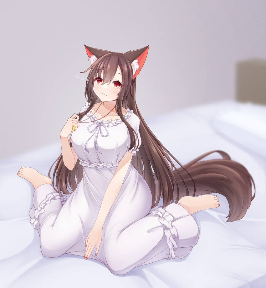 1girl alternate_costume animal_ear_fluff animal_ears barefoot blurry brown_hair closed_mouth commentary_request depth_of_field hair_between_eyes hashi2387 highres holding imaizumi_kagerou jewelry light_blush long_hair necklace nightgown on_bed pendant red_eyes short_sleeves sitting solo tail touhou very_long_hair wariza white_nightgown wolf_ears wolf_girl wolf_tail