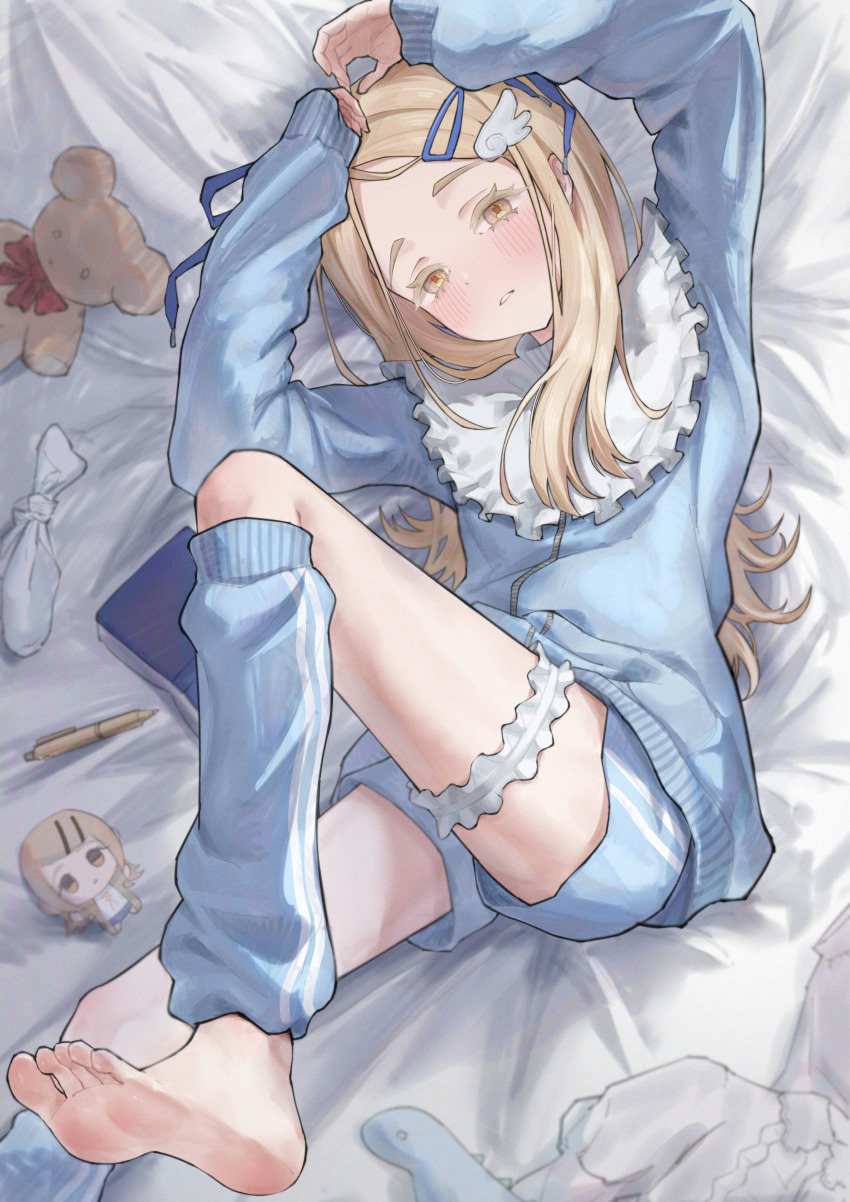 1girl absurdres arms_up barefoot bed_sheet blonde_hair blue_jacket blue_leg_warmers blue_shorts book bridal_garter character_doll colored_eyelashes commentary crane666 feet gakuen_idolmaster hair_ornament hairclip half-closed_eyes highres idolmaster jacket leg_warmers legs long_hair looking_at_viewer lying on_back orange_eyes parted_lips pen shinosawa_hiro shorts soles solo stuffed_animal stuffed_toy teddy_bear toes wing_hair_ornament