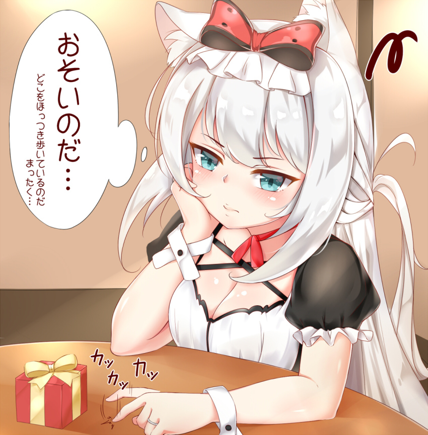 1girl animal_ears annoyed aono_(f_i_s) arm_support azur_lane black_dress blue_eyes blush bow box breasts cat_ears cleavage closed_mouth commentary_request dress gift gift_box hair_bow hammann_(azur_lane) head_rest highres long_hair medium_breasts puffy_short_sleeves puffy_sleeves red_bow short_sleeves silver_hair sitting solo table tapping tapping_finger translation_request valentine very_long_hair wrist_cuffs