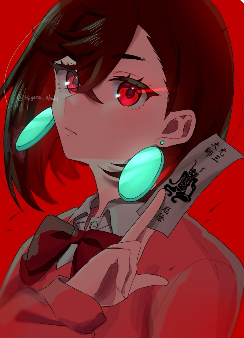 1girl ayase_momo bow bowtie brown_hair closed_mouth collared_shirt commentary dandadan dress_shirt earrings floating_earring hair_behind_ear hair_between_eyes higasa_(user_aumh8787) highres holding holding_ofuda jewelry looking_at_viewer loose_bowtie pink_sweater red_background red_bow red_bowtie red_eyes school_uniform shirt short_hair solo sweater twitter_username upper_body white_shirt