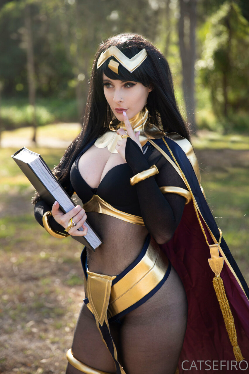 1girl black_bra blunt_bangs blurry blurry_background bodystocking book bra breasts cape curvy finger_to_mouth fire_emblem fire_emblem_awakening gold_trim holding holding_book long_hair medium_breasts multicolored_cape multicolored_clothes nintendo pelvic_curtain photo_(medium) sabercreative solo tharja_(fire_emblem) tharja_(fire_emblem)_(cosplay) thick_thighs thighs tiara turtleneck underwear