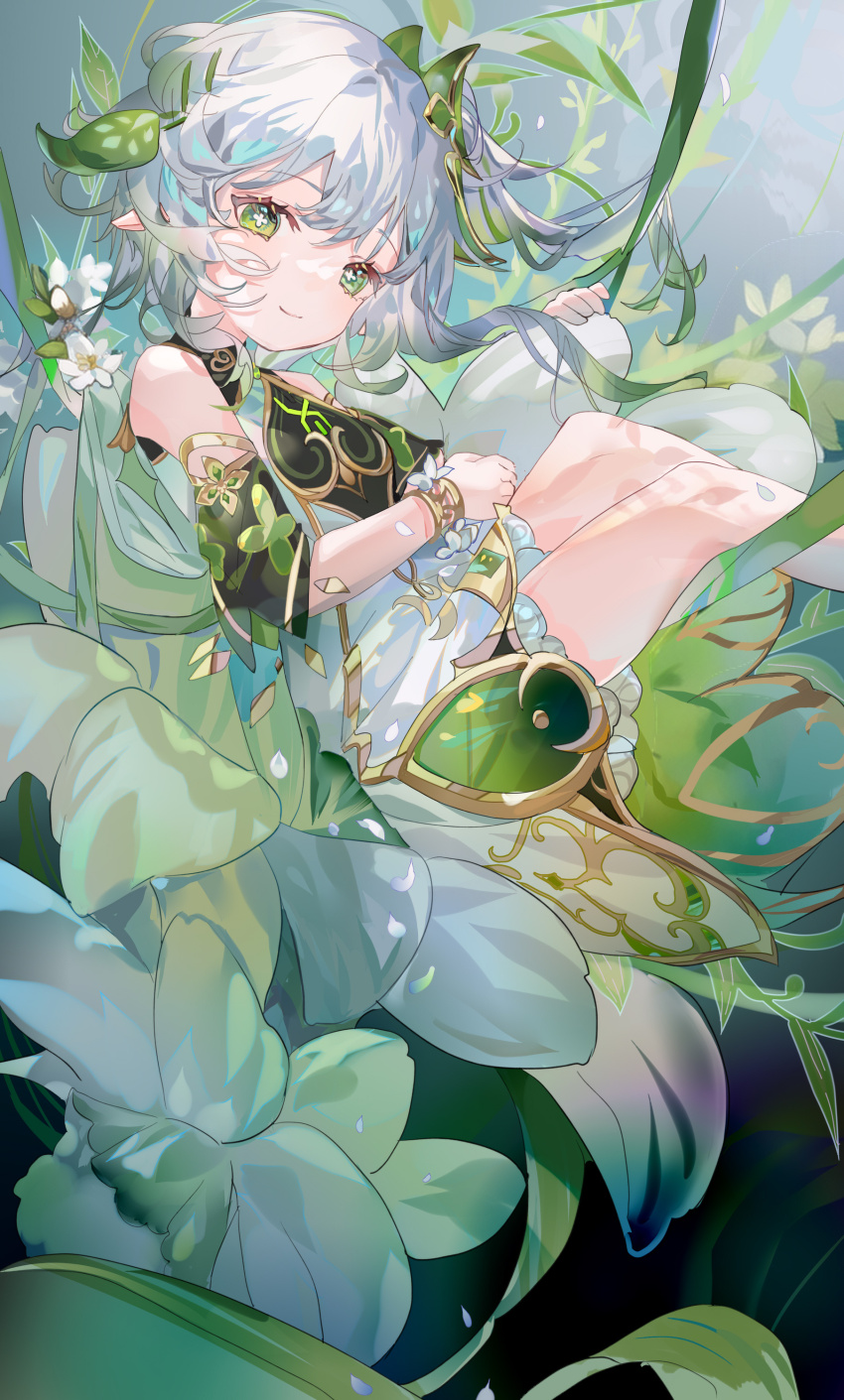 1girl absurdres bare_shoulders bloomers cape closed_mouth cross-shaped_pupils detached_sleeves dress flower fre_(haochilanzuo) genshin_impact green_cape green_eyes green_sleeves hair_ornament highres jewelry leaf leaf_hair_ornament looking_at_viewer nahida_(genshin_impact) plant pointy_ears sitting smile symbol-shaped_pupils underwear white_dress white_flower white_hair