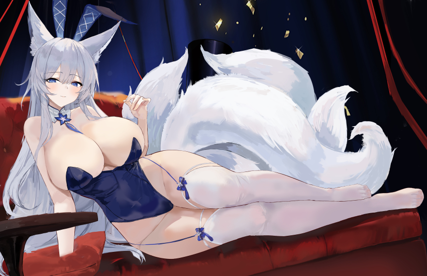 1girl absurdres animal_ear_fluff animal_ears azur_lane blue_eyes blue_leotard breasts cleavage closed_mouth detached_collar fake_animal_ears fox_ears fox_tail garter_straps hand_up highleg highleg_leotard highres huge_breasts kitsune leotard long_hair looking_at_viewer lying multiple_tails no_shoes official_alternate_costume on_side playboy_bunny rabbit_ears shinano_(azur_lane) shinano_(visions_of_fantasy)_(azur_lane) sitting smile solo strapless strapless_leotard suo_bu_ye_feng tail thighhighs thighs variant_set very_long_hair white_hair white_thighhighs yokozuwari