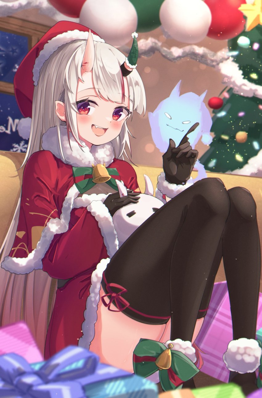 1girl :d alternate_costume bell black_gloves black_thighhighs blush bow bowtie capelet christmas christmas_ornaments christmas_tree commentary_request fang fur-trimmed_capelet fur-trimmed_sleeves fur_trim gift gloves hat highres hololive horns indoors long_hair looking_at_viewer merry_christmas multicolored_hair nakiri_ayame namaonpa night open_mouth poyoyo_(nakiri_ayame) red_eyes red_hair santa_costume santa_hat sitting skin-covered_horns smile streaked_hair thighhighs virtual_youtuber white_hair