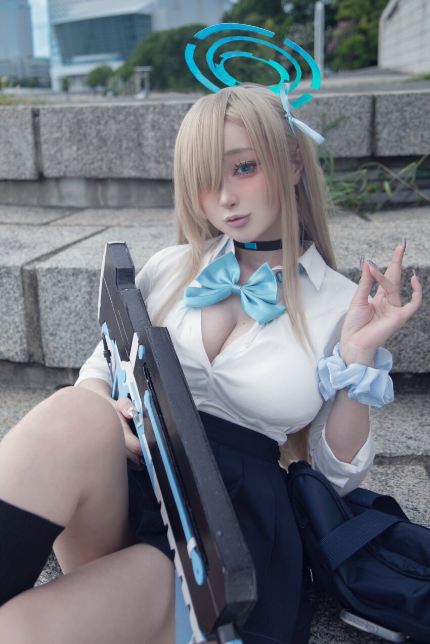 asuna_(blue_archive) blonde_hair blue_archive blue_eyes breasts chamomile_(cosplayer) cleavage cosplay cosplay_photo fingernails highres holding holding_weapon mole mole_on_breast outdoors photo_(medium) school_uniform weapon