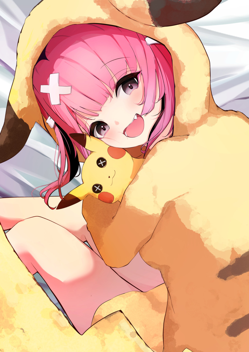 1girl :d bed_sheet character_doll commentary_request coral_(pokemon) creatures_(company) game_freak gen_1_pokemon hair_ornament happy highres hood hood_up looking_at_viewer nintendo open_mouth pajamas pikachu pink_eyes pink_hair pokemon pokemon_(anime) pokemon_horizons sitting smile solo teeth tsukune2398