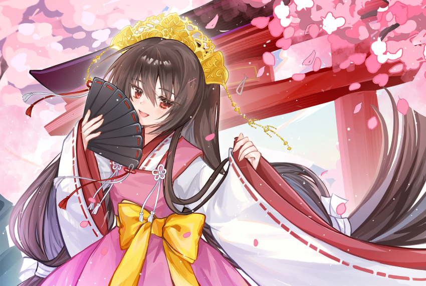 1girl :d blush bow brown_hair cherry_blossoms chinese_commentary colored_eyelashes commentary_request cowboy_shot day eyes_visible_through_hair floating_hair folding_fan hair_between_eyes hand_fan hands_up highres holding holding_fan japanese_clothes long_hair long_sleeves looking_at_viewer low-tied_long_hair miko open_mouth outdoors red_eyes ribbon-trimmed_sleeves ribbon_trim sidelocks smile solo spring_(season) tenshinranman torii unohana_no_sakuyahime very_long_hair wide_sleeves yellow_bow yuyu_usaki