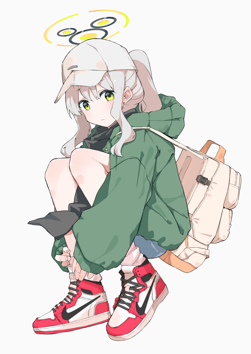 1girl absurdres backpack bag baseball_cap blue_archive closed_mouth full_body green_eyes green_jacket grey_background grey_hair halo hare_(blue_archive) hare_(camp)_(blue_archive) hat highres hood hood_down hooded_jacket hugging_own_legs jacket long_hair long_sleeves looking_at_viewer nike_(company) ponytail red_footwear shoes sidelocks simple_background sneakers solo white_hat yakiniku-joan.