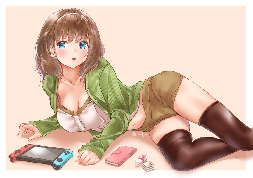 aqua_eyes black_legwear blush brown_hair brown_shorts cellphone cosmetics green_sweater headband highres koji_(kojikojimdw) lips makeup nail_polish_bottle navel nintendo_switch original pearl_hair_ornament phone short_hair shorts sweater