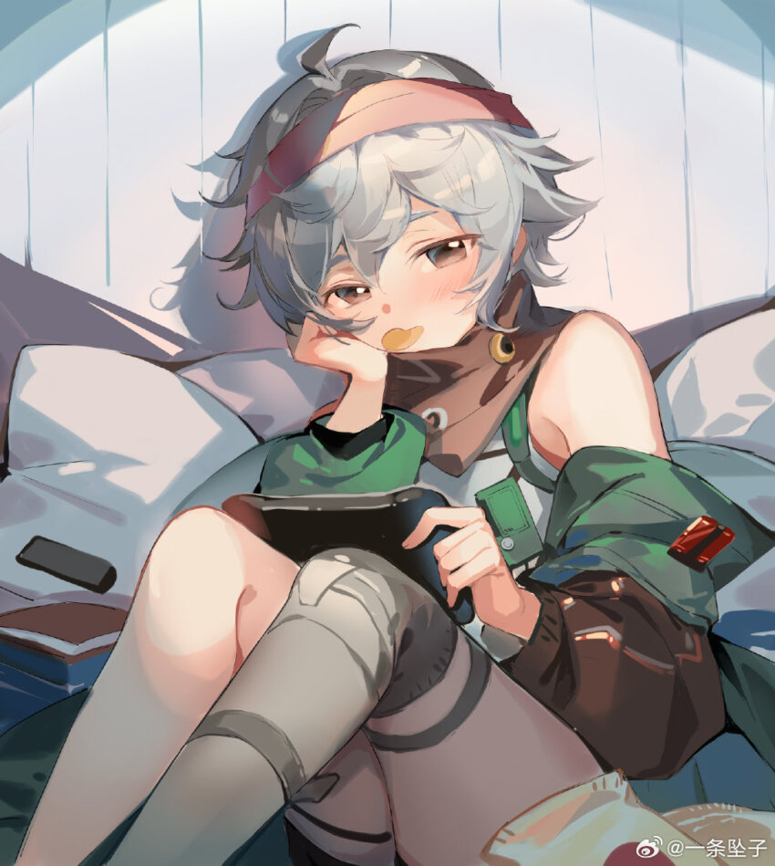 1girl ahoge bandana blush chinese_commentary chips_(food) commentary_request food food_in_mouth g11_(girls&#039;_frontline) girls&#039;_frontline girls&#039;_frontline_2:_exilium green_jacket grey_hair hand_on_own_head handheld_game_console highres holding holding_handheld_game_console jacket looking_at_viewer messy_hair open_clothes open_jacket pillow red_bandana short_hair sitting solo weibo_logo weibo_watermark zukiyn