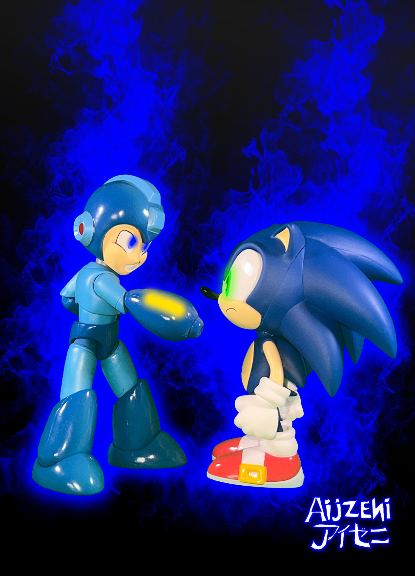 2boys absurdres action_figure aijzeni angry aura black_background capcom deviantart_username frown glowing glowing_eyes goodsmile_company highres jada_toys mega_man_(series) megaman_(game) multiple_boys nendoroid photo_(medium) photo_(object) photoshop_(medium) sega self-upload simple_background sonic_(series) sonic_the_hedgehog teeth toy twitter watermark