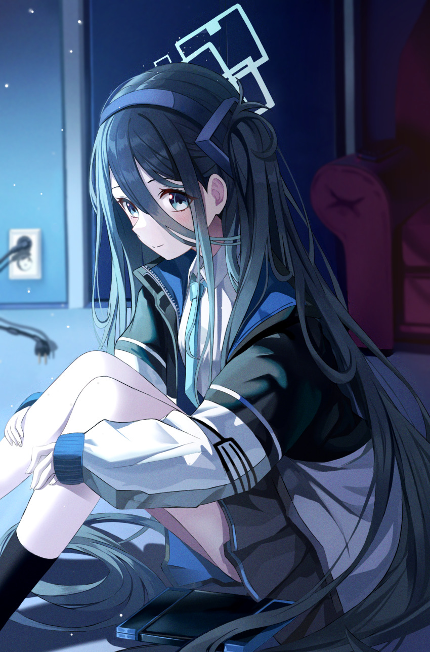 1girl aqua_halo aris_(blue_archive) blue_archive blue_eyes blue_hair blue_halo blurry blurry_background commentary couch dark_blue_hair door hair_between_eyes halo handheld_game_console headband highres jacket long_hair long_hair_between_eyes necktie school_uniform sitting smile very_long_hair watermelon_(subak_jelly)