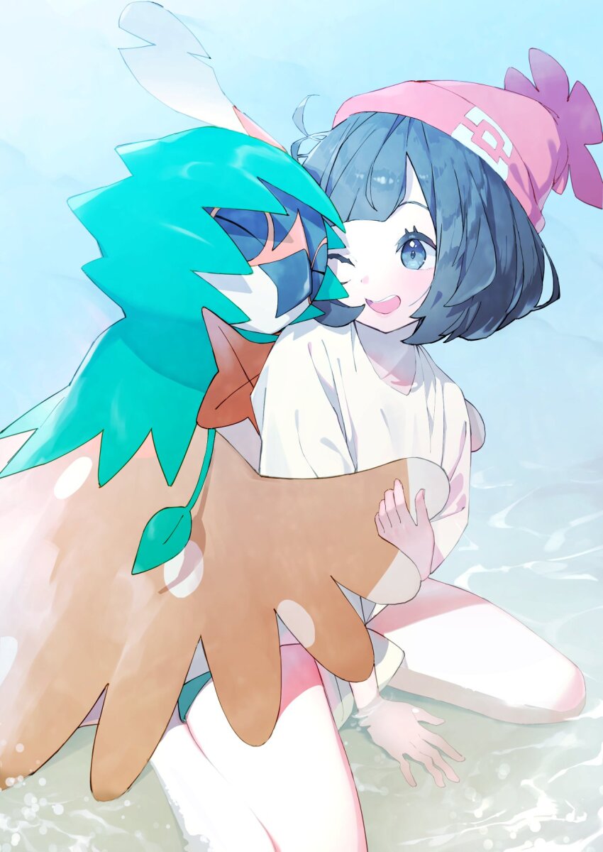 1girl ;d aqua_shorts beanie black_eyes black_hair creatures_(company) decidueye game_freak gen_7_pokemon hat highres nintendo one_eye_closed open_mouth pokemon pokemon_(creature) pokemon_sm red_hat rindoriko selene_(pokemon) shirt short_hair shorts sitting smile swept_bangs teeth tied_shirt upper_teeth_only water white_shirt