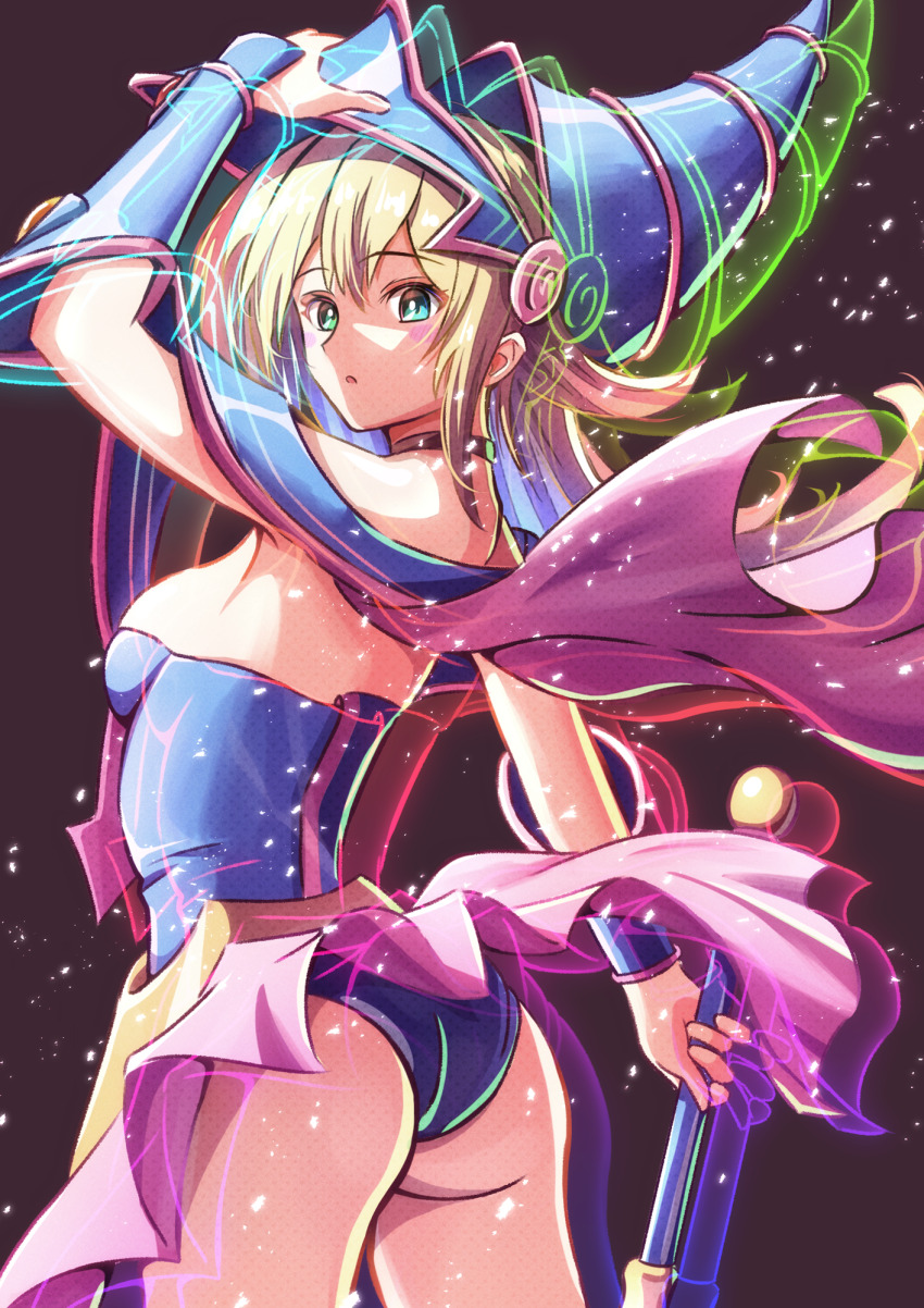 1girl ass black_choker blonde_hair blue_hat blue_leotard bracer cape choker commentary cowboy_shot dark_magician_girl duel_monster from_behind green_eyes h_knight_37 hand_on_headwear hat highres holding holding_wand leotard long_hair looking_at_viewer looking_back miniskirt open_mouth pink_cape pink_skirt pleated_skirt skirt solo standing strapless strapless_leotard wand wind wizard_hat yu-gi-oh!