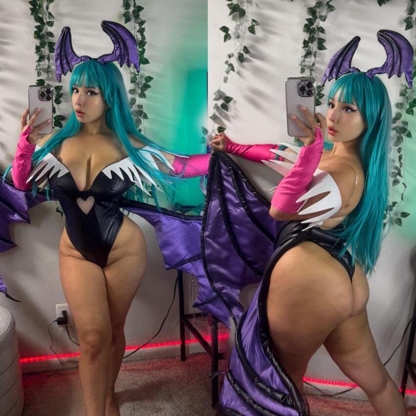 1girl absurdres ass breasts capcom cellphone cleavage darkstalkers fake_head_wings fake_wings female_focus green_hair head_wings highres huge_ass large_breasts long_hair looking_at_viewer morrigan_aensland multiple_views phone real_life selfie smartphone thick_thighs thighs wings