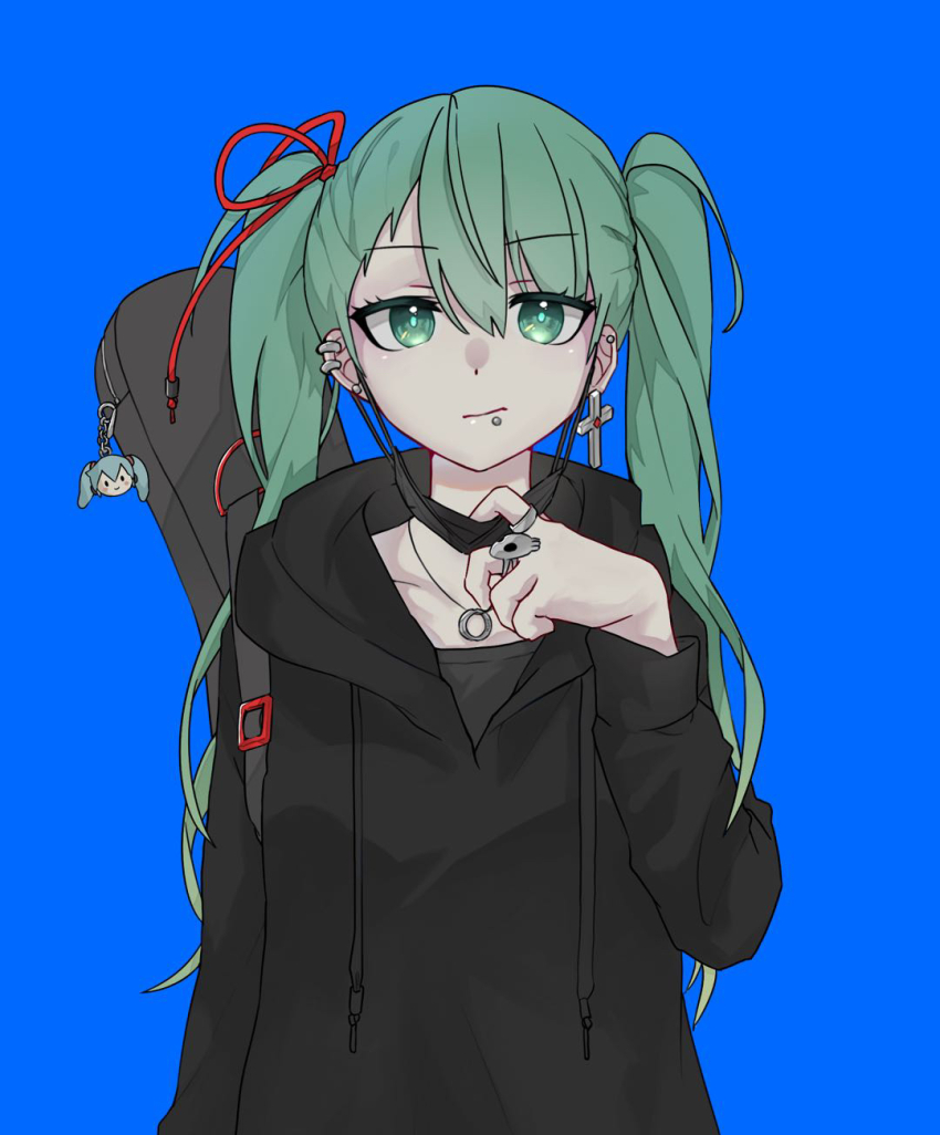 1girl black_mask black_shirt blue_background character_charm charm_(object) cross cross_earrings ear_piercing earrings green_eyes green_hair guitar_case hatsune_miku highres hood hood_down hoodie instrument_case jewelry lip_piercing long_hair looking_at_viewer mask_pull necklace piercing ring shirt tsubaki_kaoi twintails upper_body vocaloid