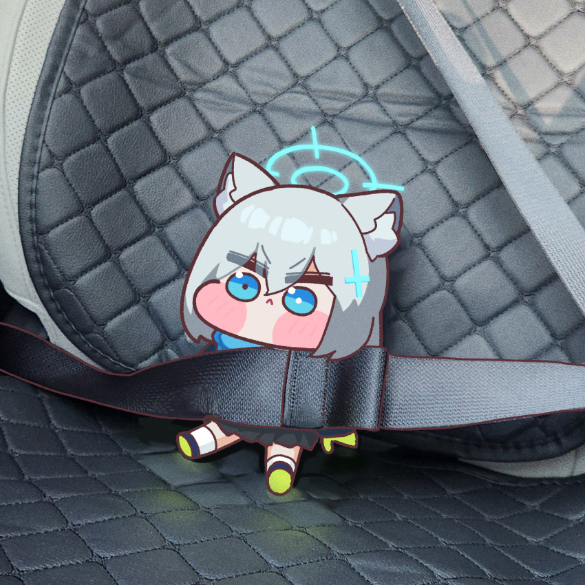 1girl :&lt; animal_ear_fluff animal_ears aqua_scarf black_skirt blue_archive blue_eyes blue_halo car_interior car_seat chibi cross cross_hair_ornament extra_ears gloves grey_hair hair_ornament halo highres inverted_cross mismatched_pupils photo_background rocktide scarf seatbelt shiroko_(blue_archive) short_hair sitting skirt solo v-shaped_eyebrows wolf_ears