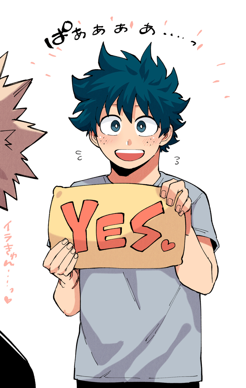 2boys bakugou_katsuki black_pants black_shirt blonde_hair blush boku_no_hero_academia freckles green_eyes green_hair grey_shirt highres holding holding_pillow male_focus midoriya_izuku multiple_boys open_mouth pants pillow shirt short_hair short_sleeves spiked_hair t-shirt white_background yazaki_(yazakc) yes-no_pillow