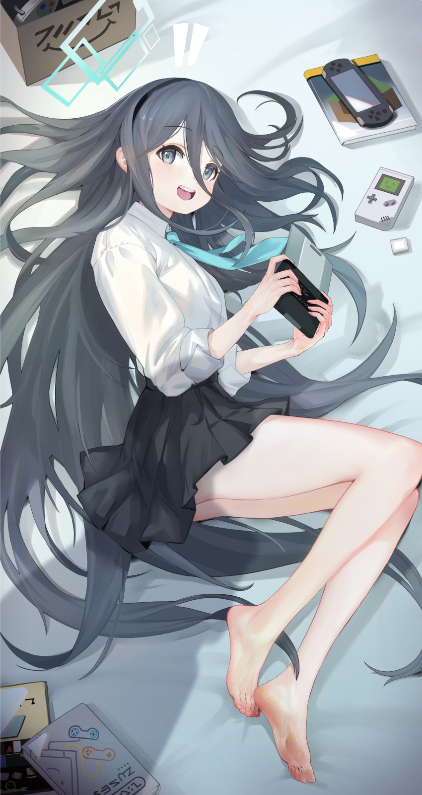 1girl absurdres aris_(blue_archive) barefoot black_hair blue_archive feet gameboy hairband handheld_game_console highres keji133 light_blush long_hair looking_at_viewer lying on_side open_mouth playing_games soles toes