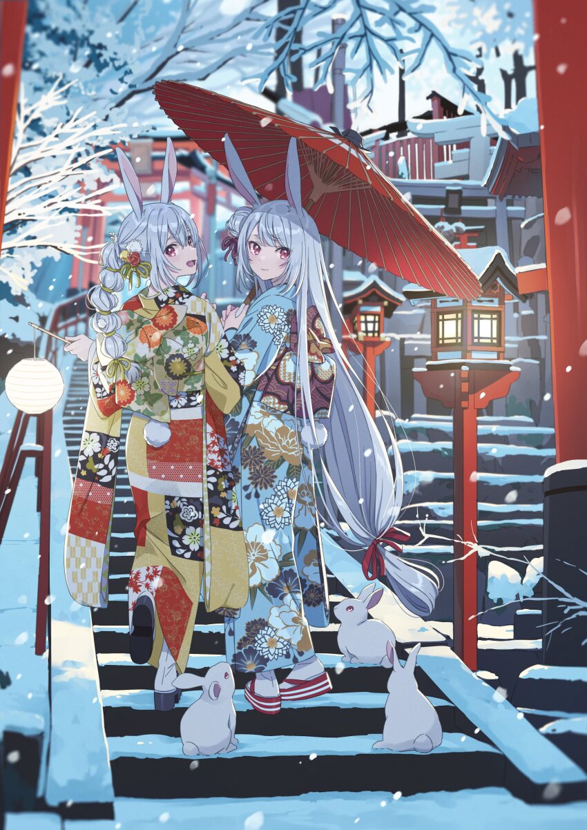 2girls absurdres animal_ears black_footwear blue_kimono blurry blurry_background commentary_request feet_up floral_print from_behind full_body geta hair_between_eyes hand_up hechima_(issindotai) highres holding holding_lantern holding_umbrella japanese_clothes kimono kinchaku lamp lantern long_hair long_sleeves looking_at_viewer looking_back multiple_girls obi obijime oil-paper_umbrella open_mouth original pouch rabbit rabbit_ears rabbit_girl rabbit_tail red_eyes red_footwear red_ribbon ribbon sash shrine smile snowing stairs tail torii tree umbrella very_long_hair white_hair yellow_kimono