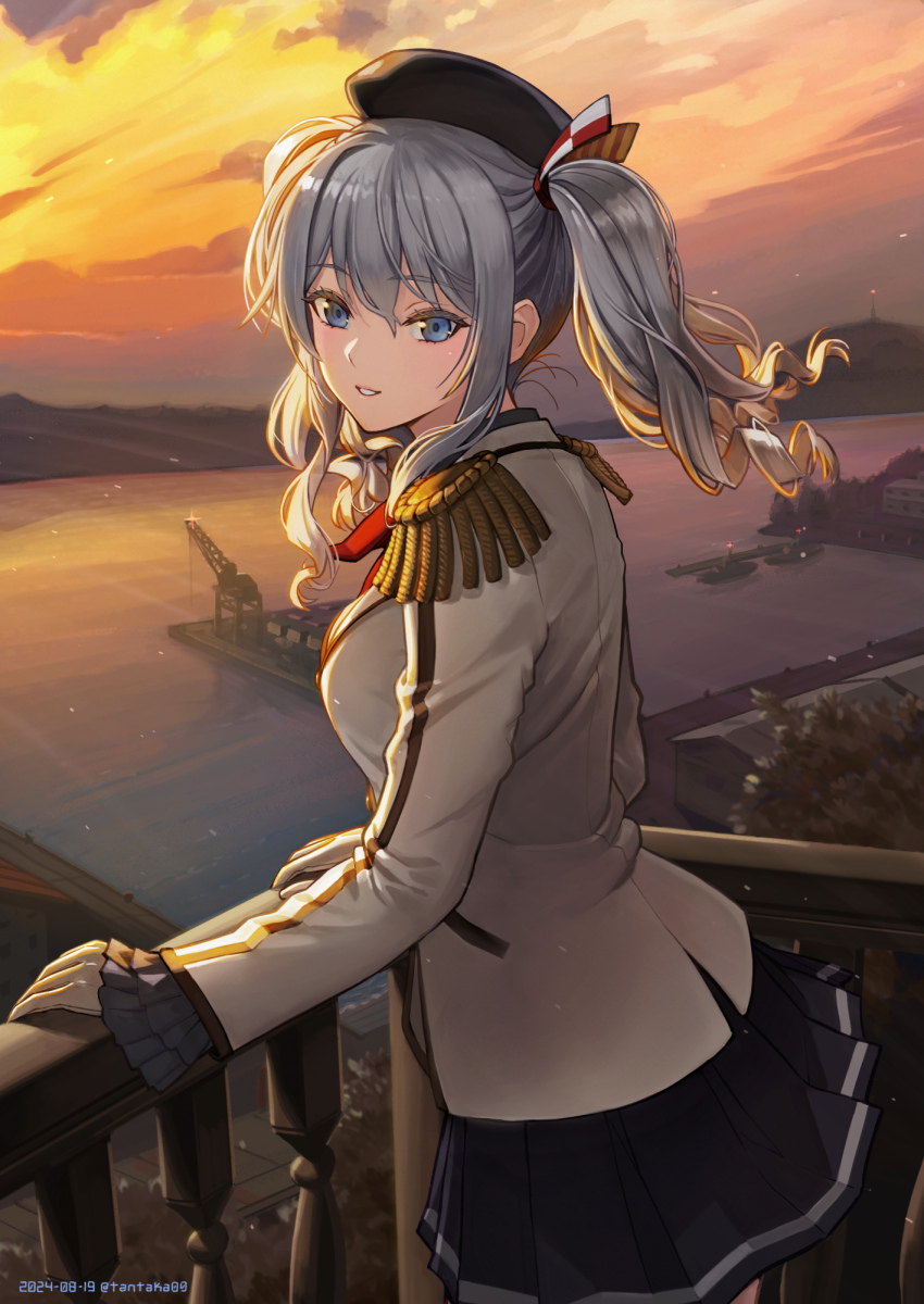 1girl beret black_hat black_skirt blue_eyes breasts building crane_(machine) epaulettes frilled_sleeves frills gloves grey_hair hair_between_eyes hat highres jacket kantai_collection kashima_(kancolle) large_breasts long_hair looking_at_viewer military_jacket miniskirt neckerchief outdoors pleated_skirt red_neckerchief skirt solo tantaka twintails wavy_hair white_gloves