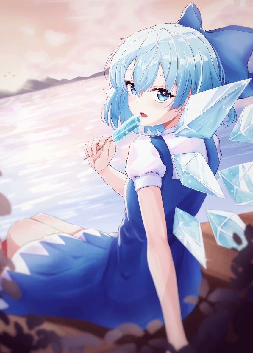 1girl arm_support blue_bow blue_dress blue_eyes blue_hair blush bow cirno cloud collared_dress commentary detached_wings dress dutch_angle enpixi feet_out_of_frame food from_behind hair_bow highres holding holding_food holding_popsicle ice ice_wings lake leaf light_blue_hair looking_at_viewer looking_back medium_hair mountain open_mouth outdoors popsicle puffy_short_sleeves puffy_sleeves short_sleeves sitting sky solo sunset symbol-only_commentary touhou turning_head white_sleeves wings