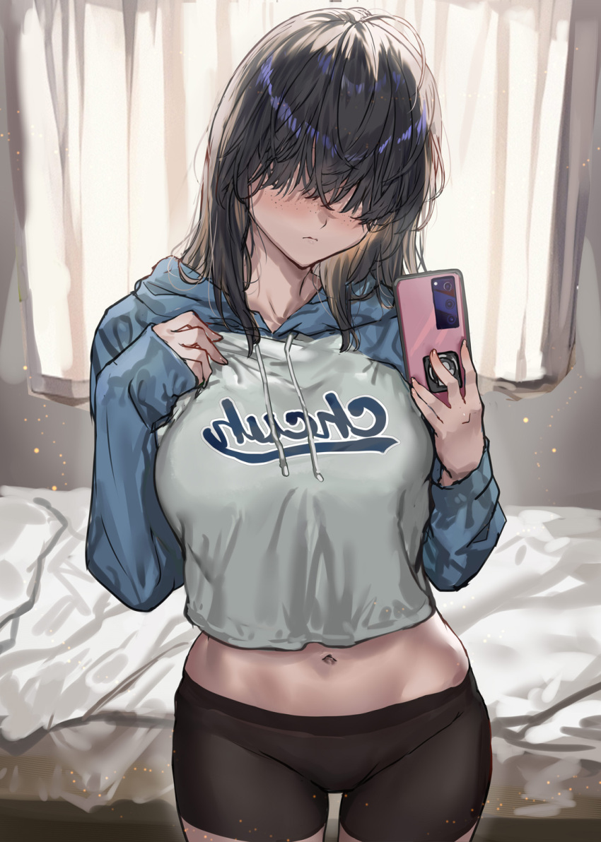 1girl bike_shorts black_hair blush cellphone closed_mouth commentary_request cowboy_shot freckles hair_over_eyes highres holding holding_phone indoors long_sleeves lowleg medium_hair mirror_image navel original phone ran&#039;ou_(tamago_no_kimi) selfie shorts smartphone solo sweater