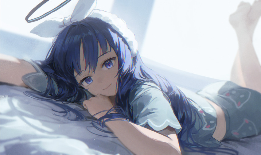 1girl animal_print aqua_pajamas bare_arms bare_legs barefoot blue_archive cat_print feet_up halo highres indoors light_smile looking_at_viewer lying meinoss midriff official_alternate_costume on_stomach pajamas purple_eyes purple_hair red_pupils short_sleeves solo yuuka_(blue_archive) yuuka_(pajamas)_(blue_archive)