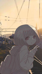  1girl :d absurdres backpack bag bob_cut commentary_request hatching_(texture) highres hood hood_down hoodie light_blush long_sleeves looking_at_viewer looking_back omochi_noa open_mouth original outdoors photo_(medium) photo_background power_lines railroad_tracks short_hair smile solo sun_glare sunset tareme upper_body v vanishing_point white_hair 