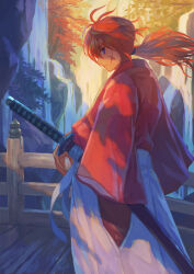 1boy absurdres bridge closed_mouth commentary_request cross_scar facial_scar from_side hakama hakama_pants highres himura_kenshin japanese_clothes katana kimono leaf long_hair long_sleeves looking_at_viewer low_ponytail maple_leaf naritate_zombie outdoors pants profile purple_eyes red_hair red_kimono rurouni_kenshin scar scar_on_cheek scar_on_face sheath sheathed solo sword weapon white_hakama wide_sleeves 