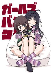  2girls :/ :d annoyed awa_subaru bean_bag_chair between_legs black_hair black_socks blue_eyes blush brown_hair choppy_bangs closed_eyes controller copyright_name crossed_ankles facing_viewer fox_(tjwls66) full_body game_controller girls_band_cry green_shirt grin highres holding holding_controller holding_game_controller hood hood_down hoodie iseri_nina leaning_to_the_side leg_lock long_sleeves looking_at_another multicolored_socks multiple_girls no_shoes open_mouth pajamas parted_bangs purple_hoodie purple_socks shirt sideways_glance sitting smile socks teeth v-shaped_eyebrows white_background yuri 