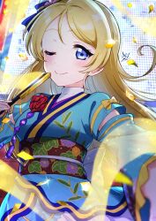1girl absurdres angelic_angel ayase_eli birthday blonde_hair blue_eyes blue_kimono blush commentary confetti hair_down hand_fan highres holding holding_fan japanese_clothes kimono kyaku_tasu long_hair looking_at_viewer love_live! love_live!_school_idol_project love_live!_the_school_idol_movie one_eye_closed signature smile solo