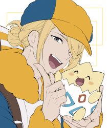  1boy :d blonde_hair blue_jumpsuit commentary_request creatures_(company) game_freak gen_2_pokemon grey_eyes hair_bun hair_over_one_eye hands_up happy hat highres holding holding_pokemon jumpsuit long_sleeves male_focus mocollie nintendo open_mouth pokemon pokemon_(creature) pokemon_legends:_arceus smile teeth togepi tongue upper_teeth_only volo_(pokemon) white_background yellow_hat 