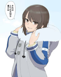  1girl blue_background brown_eyes brown_hair closed_mouth coat commentary drawstring fur-trimmed_hood fur_trim girls_und_panzer girls_und_panzer_senshadou_daisakusen! gradient_background grey_coat highres hood hood_down hooded_coat long_hair long_sleeves looking_at_viewer mika_(girls_und_panzer) no_headwear official_alternate_costume smile solo sweater translated turtleneck wata_do_chinkuru yellow_sweater 