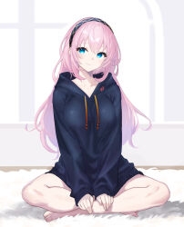  1girl barefoot black_hoodie blue_eyes breasts closed_mouth collarbone commentary_request full_body hairband highres hood hood_down hoodie indian_style indoors large_breasts light_blush long_hair long_sleeves looking_at_viewer megurine_luka pink_hair sitting smile solo toes vocaloid window yukihane_(snowowl515) 